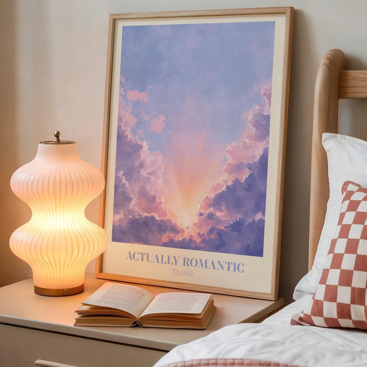 Actually Romantic lyric wall art print inspired by Taylor Swift on a bedside table next to a lamp