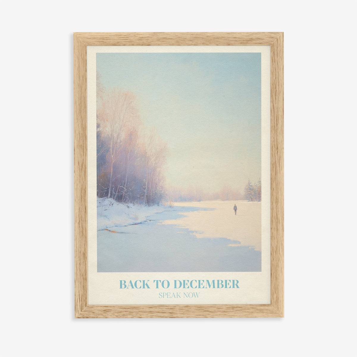 Back To December Taylor Swift print of a lone figure by a frozen winter river, in an oak frame on a plain wall