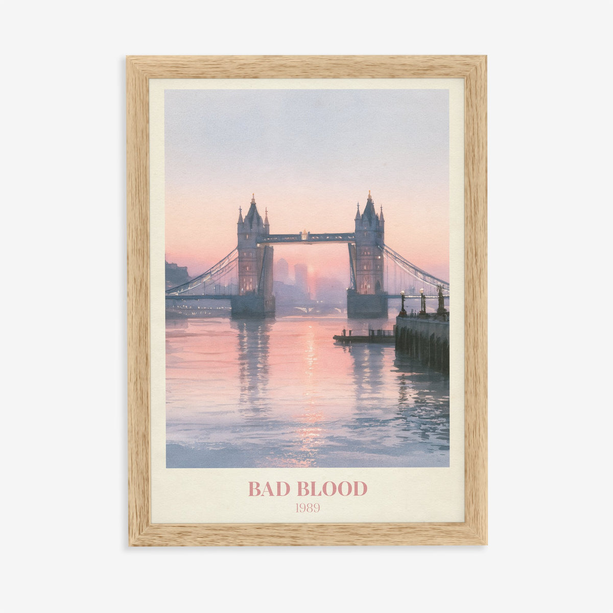 Bad Blood Taylor Swift print of Tower Bridge at a pink sunset, in an oak frame on a plain wall