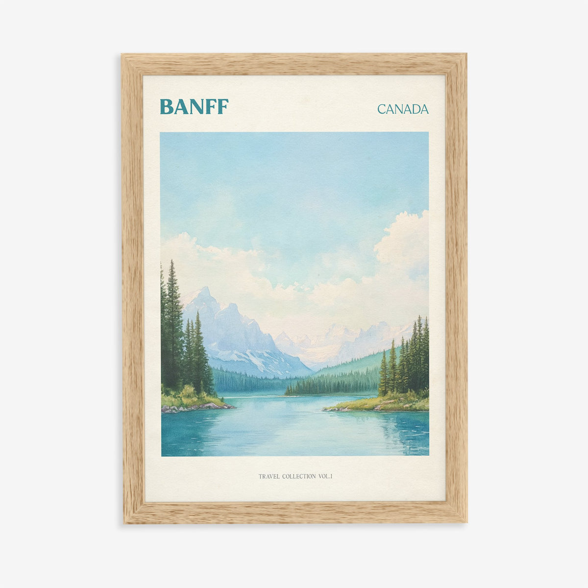 Banff travel print of snowy mountains and pine trees around a turquoise lake, in an oak frame on a plain wall