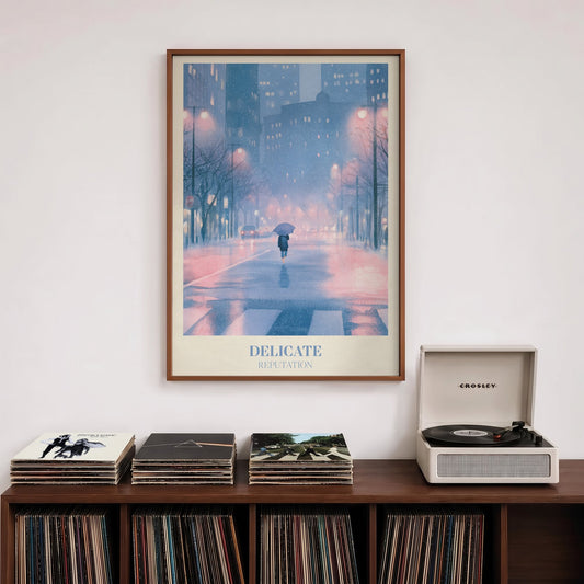 Delicate Taylor Swift print of a rainy city street at night, hung above a record shelf and a record player