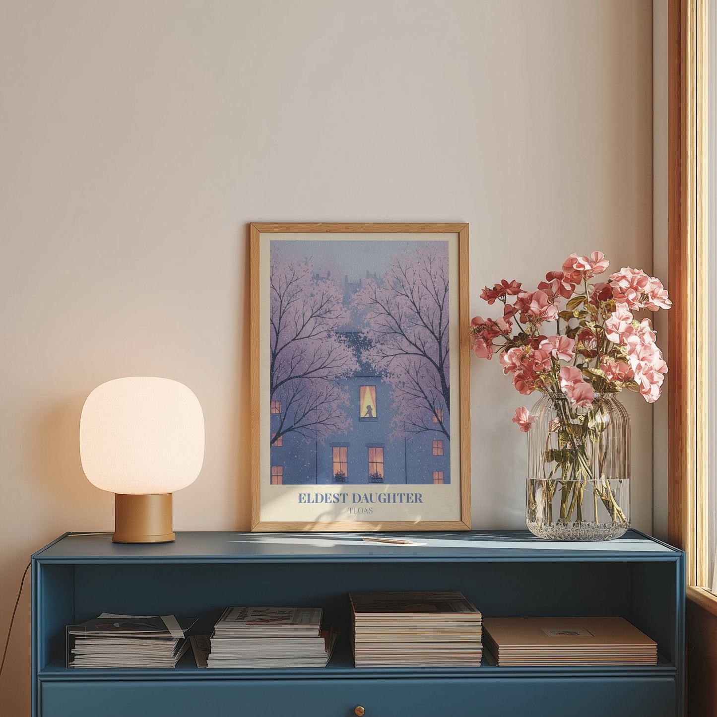 Eldest Daughter lyric wall art print inspired by Taylor Swift on a blue sideboard with a lamp and flowers