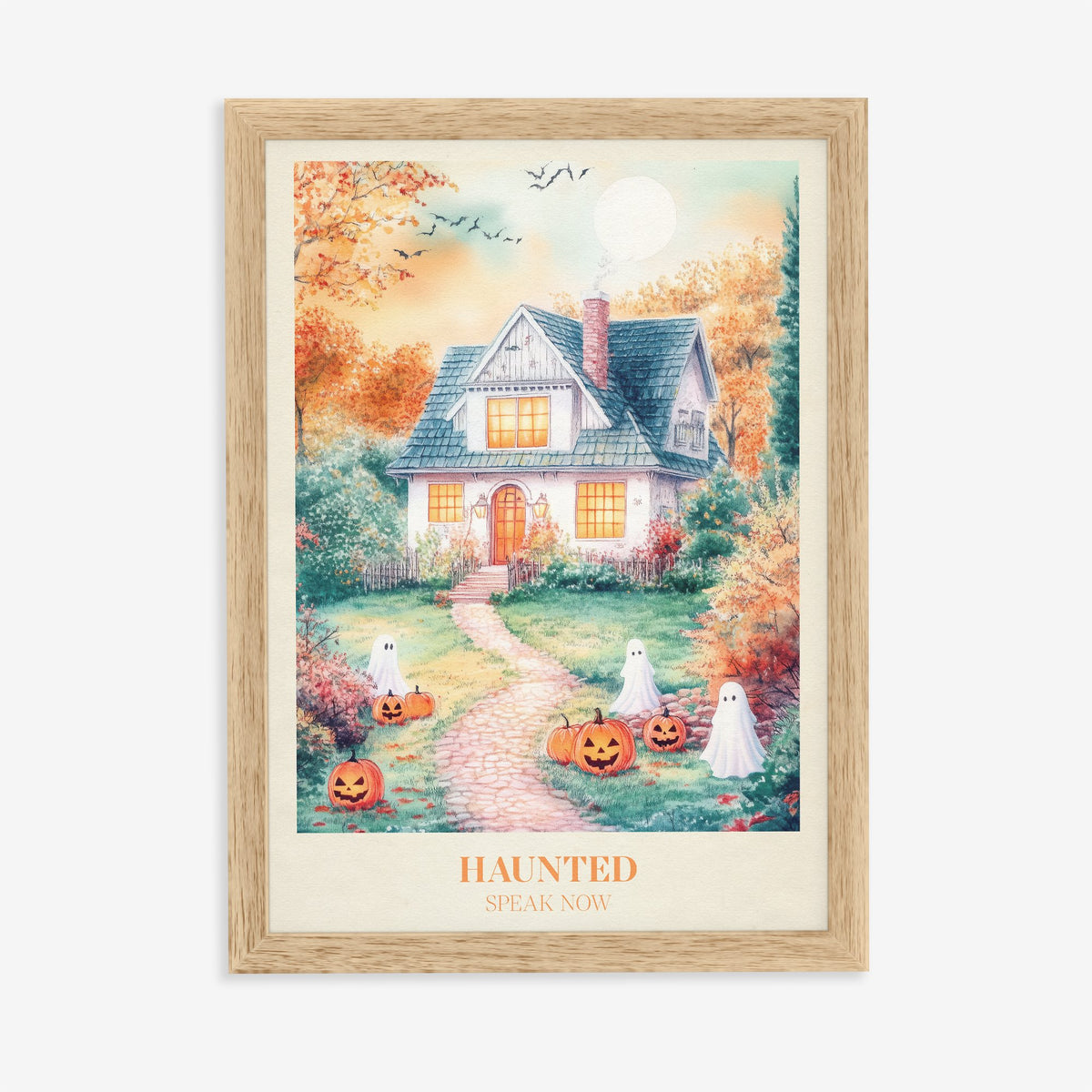 Haunted Taylor Swift print of a cottage with friendly ghosts and jack-o-lanterns on the lawn, in an oak frame on a plain wall