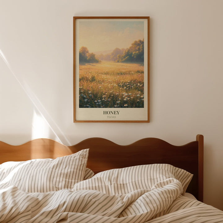 Honey lyric wall art print inspired by Taylor Swift leaning against a white wall on a wooden herringbone floor in soft daylight