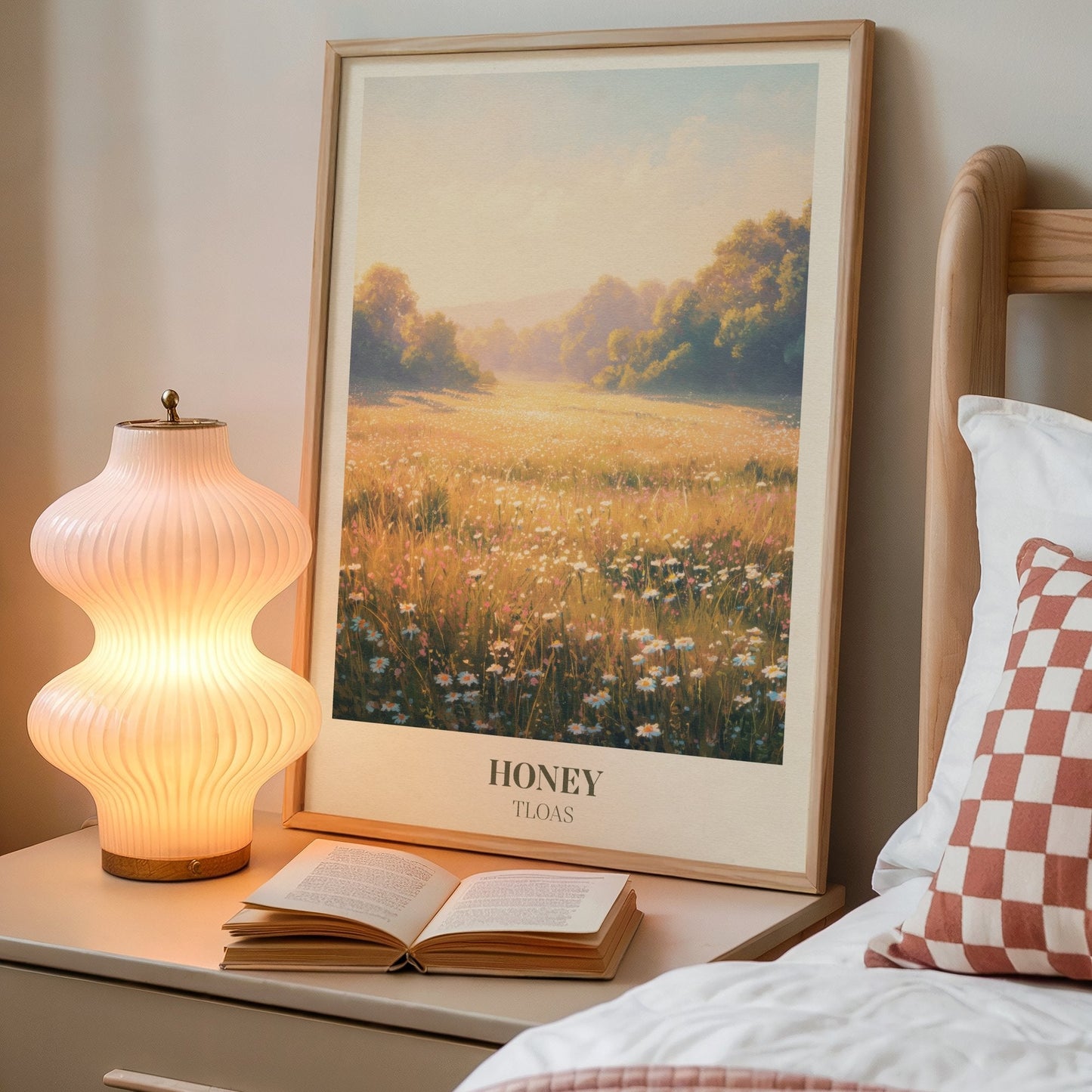 Honey lyric wall art print inspired by Taylor Swift on a bedside table next to a lamp