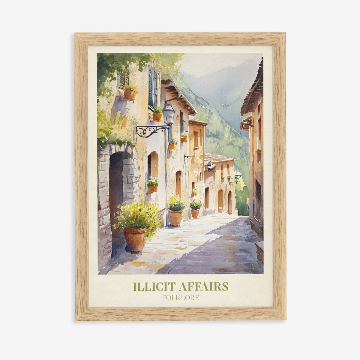 Illicit Affairs Taylor Swift print of a cobbled lane of stone houses and flowerpots, in an oak frame on a plain wall