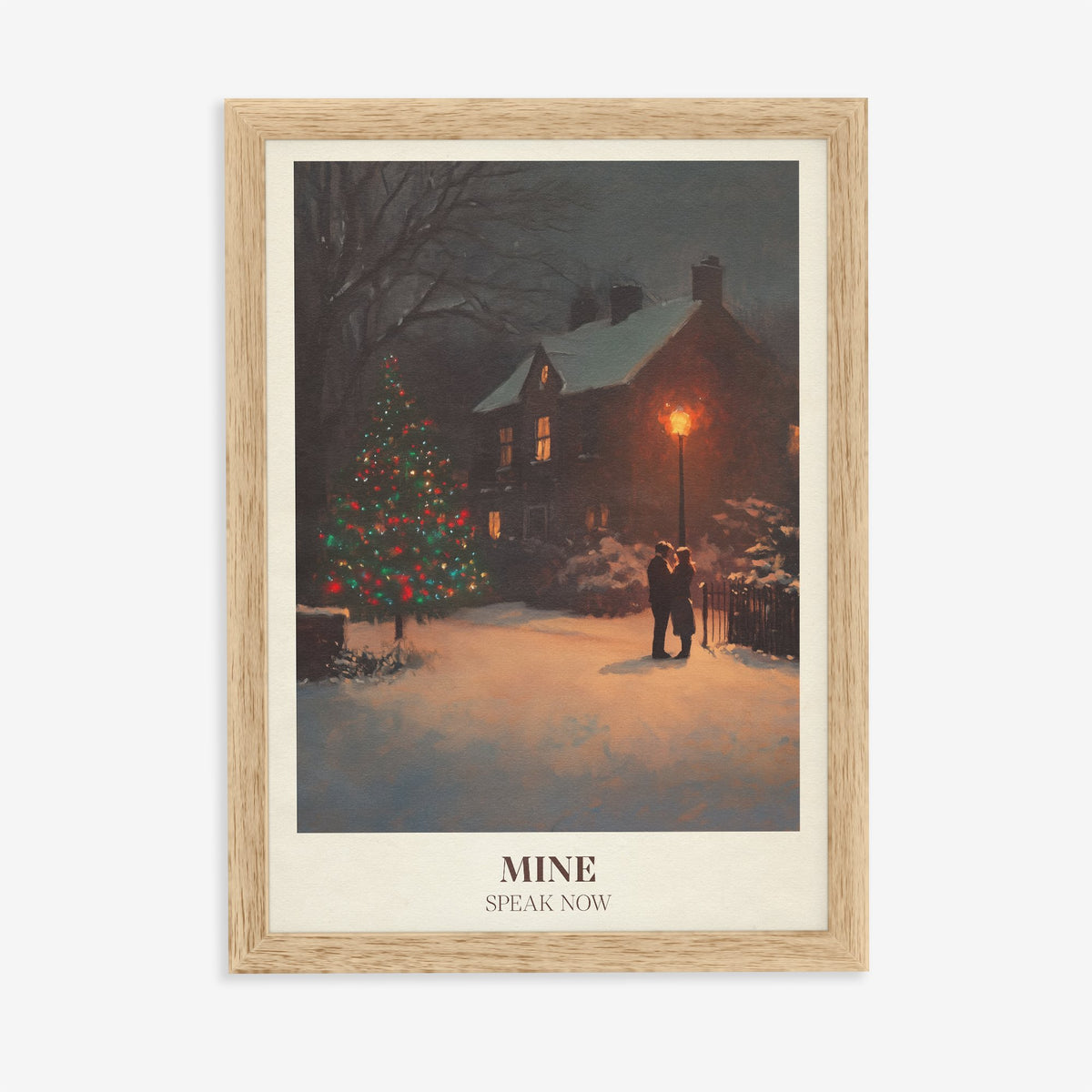 Mine Christmas Taylor Swift print of a couple by a lit Christmas tree in the snow, in an oak frame on a plain wall