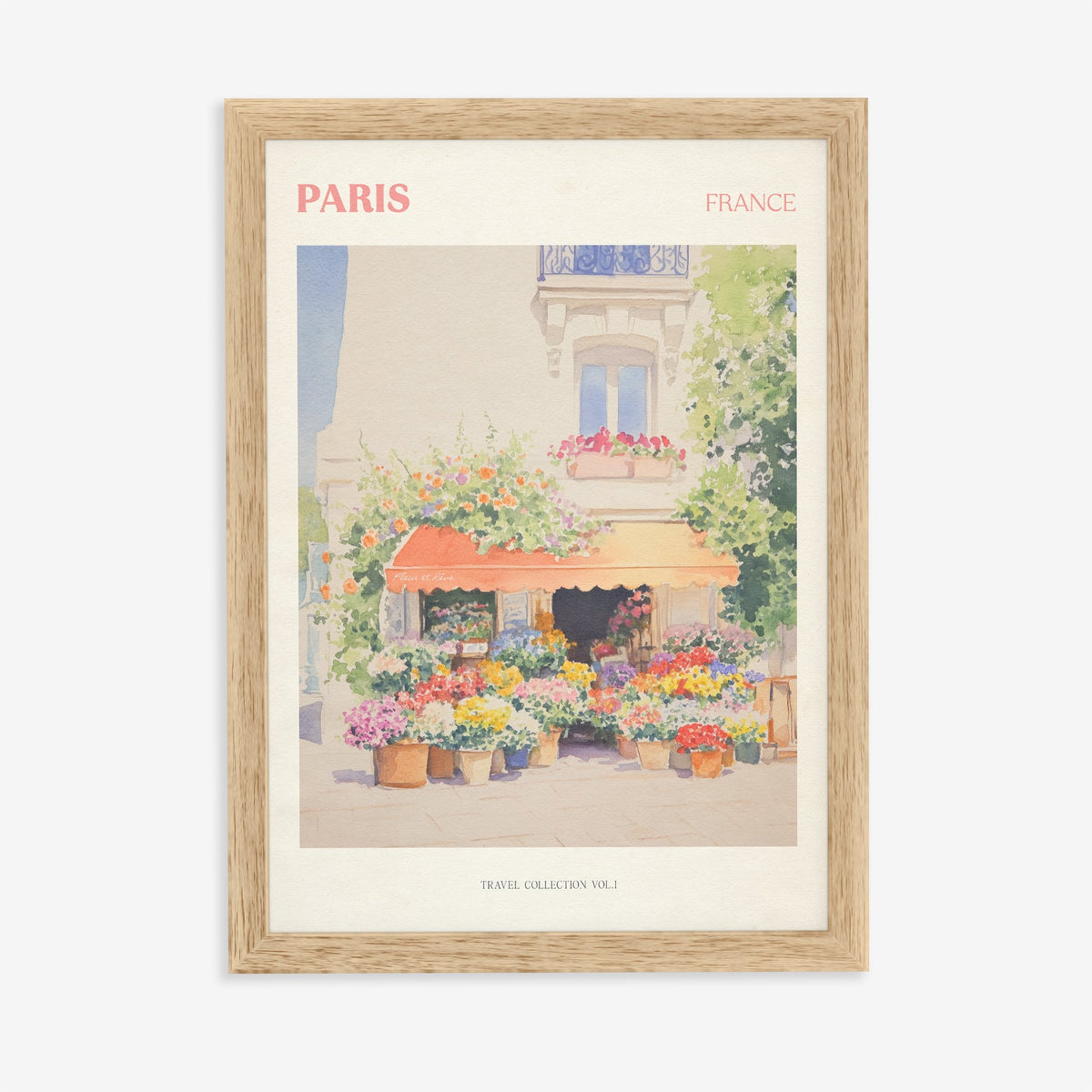 Paris travel print of a flower stall with an orange awning and pots of bright flowers, in an oak frame on a plain wall