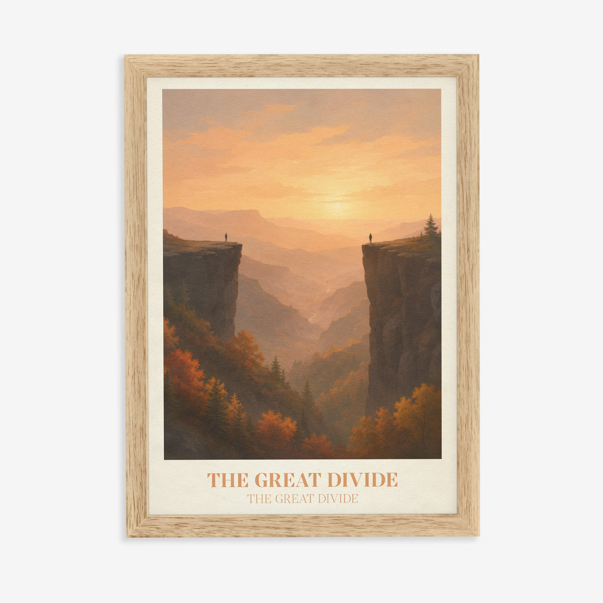 The Great Divide Noah Kahan print of a golden sunset between two cliff edges and autumn trees, in an oak frame on a plain wall