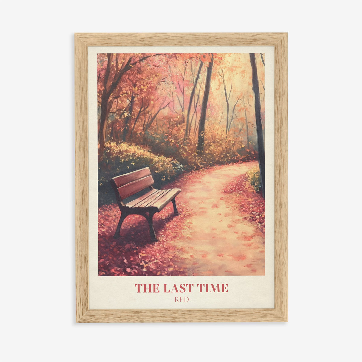 The Last Time Taylor Swift print of an empty bench on a path of red autumn leaves, in an oak frame on a plain wall