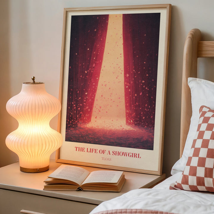 The Life Of A Showgirl lyric print inspired by Taylor Swift leaning against a white wall on a wooden herringbone floor in soft daylight