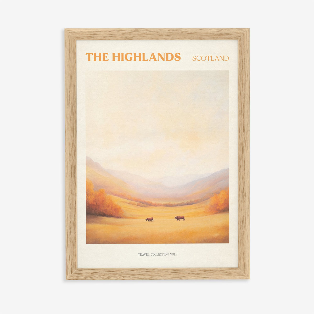 Highlands travel print of a golden autumn glen with two Highland cows under a soft peach sky, in an oak frame on a plain wall