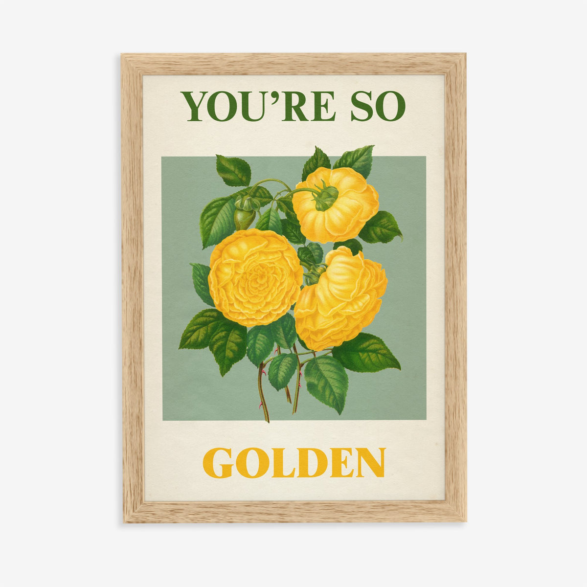 You're So Golden Harry Styles print of yellow roses on sage green, in an oak frame on a plain wall
