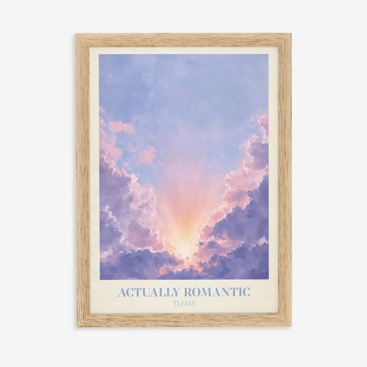 Actually Romantic Taylor Swift print of lavender clouds parting around a golden glow, in an oak frame on a plain wall