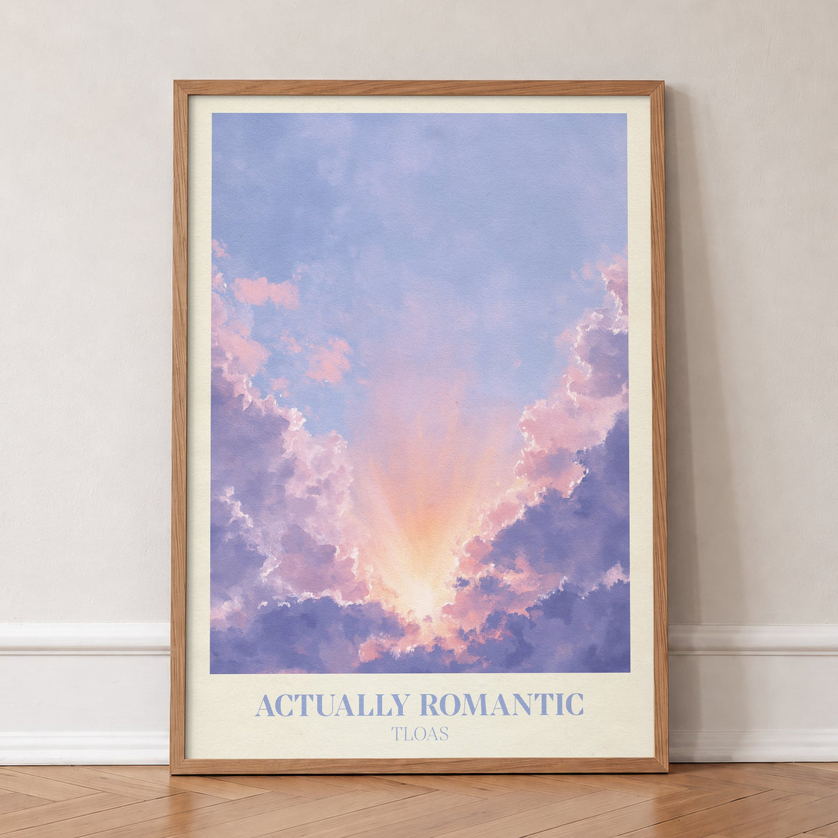 Actually Romantic Taylor Swift print of lavender clouds parting around a golden glow, in an oak frame, leaning against a wall on a herringbone floor