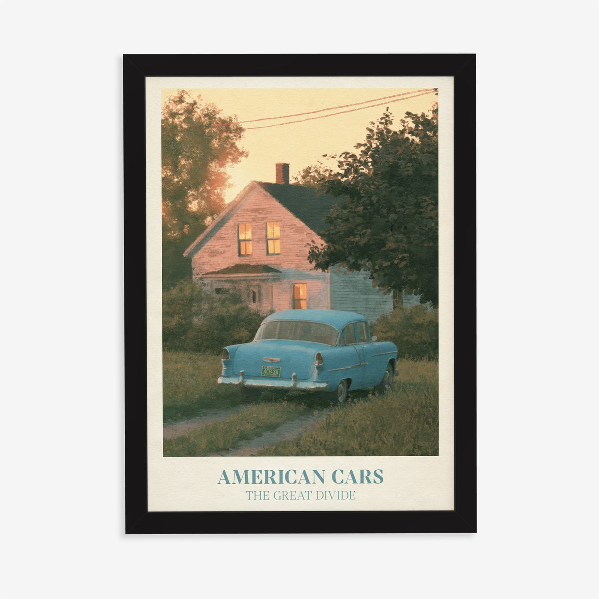 American Cars Noah Kahan print of a vintage blue car outside a glowing house at dusk, in a black frame on a plain wall