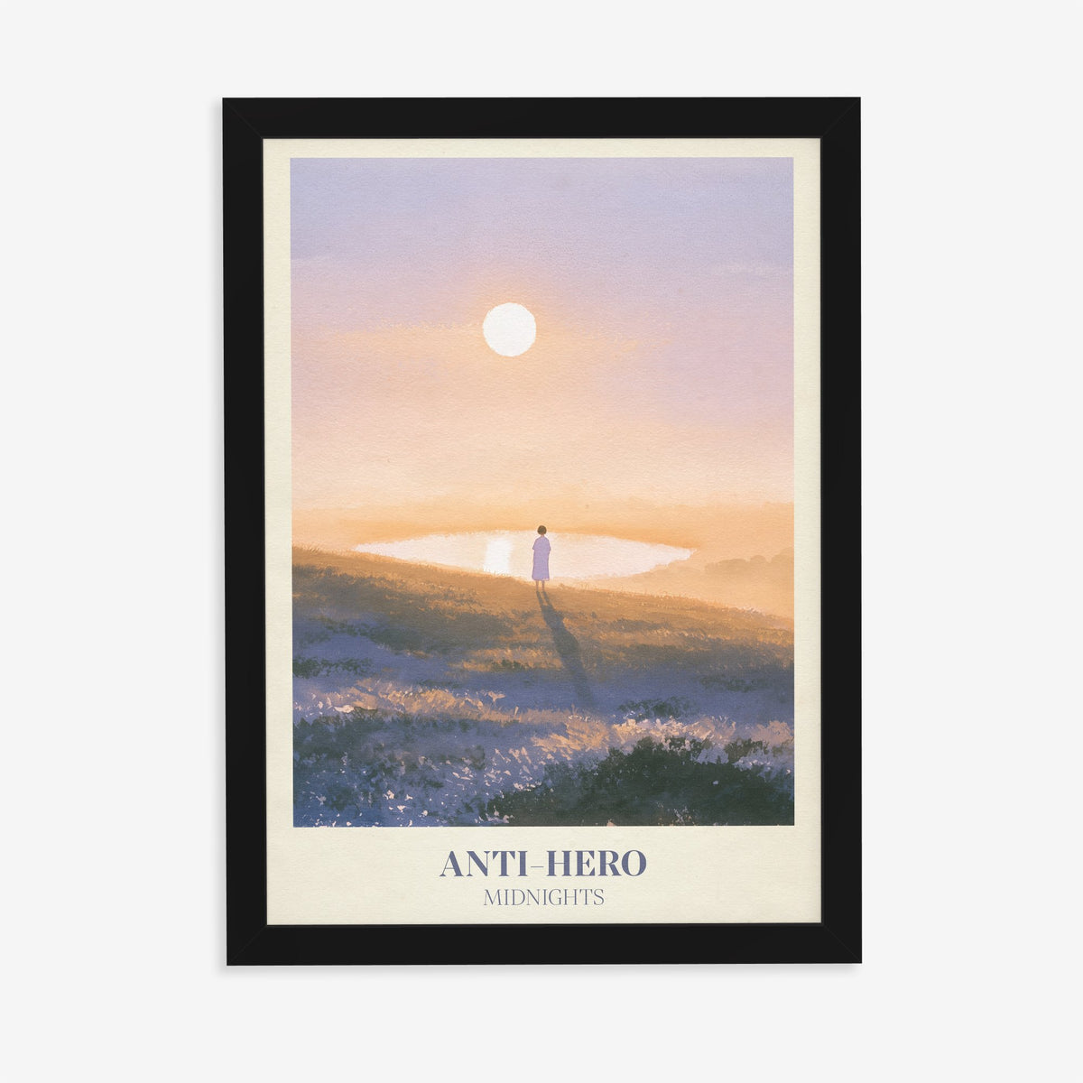 Anti-Hero Taylor Swift print of a lone figure by a lake at sunset, in a black frame on a plain wall