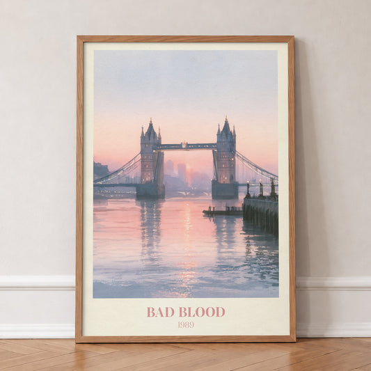 Bad Blood Taylor Swift print of Tower Bridge at a pink sunset, in an oak frame, leaning against a wall on a herringbone floor
