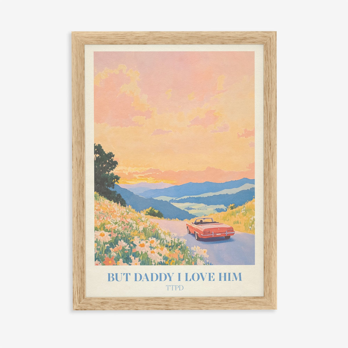 But Daddy I Love Him Taylor Swift print of a red convertible driving into a sunset, in an oak frame on a plain wall