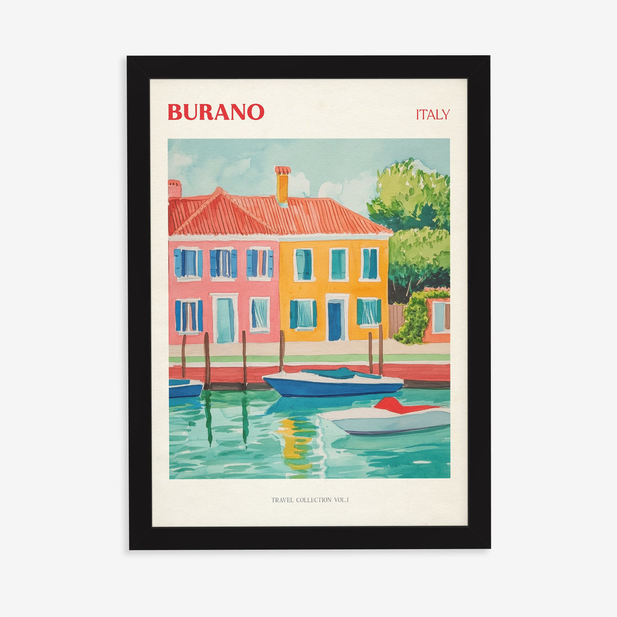Burano travel print of brightly painted red, orange and yellow houses with boats on a canal, in a black frame on a plain wall