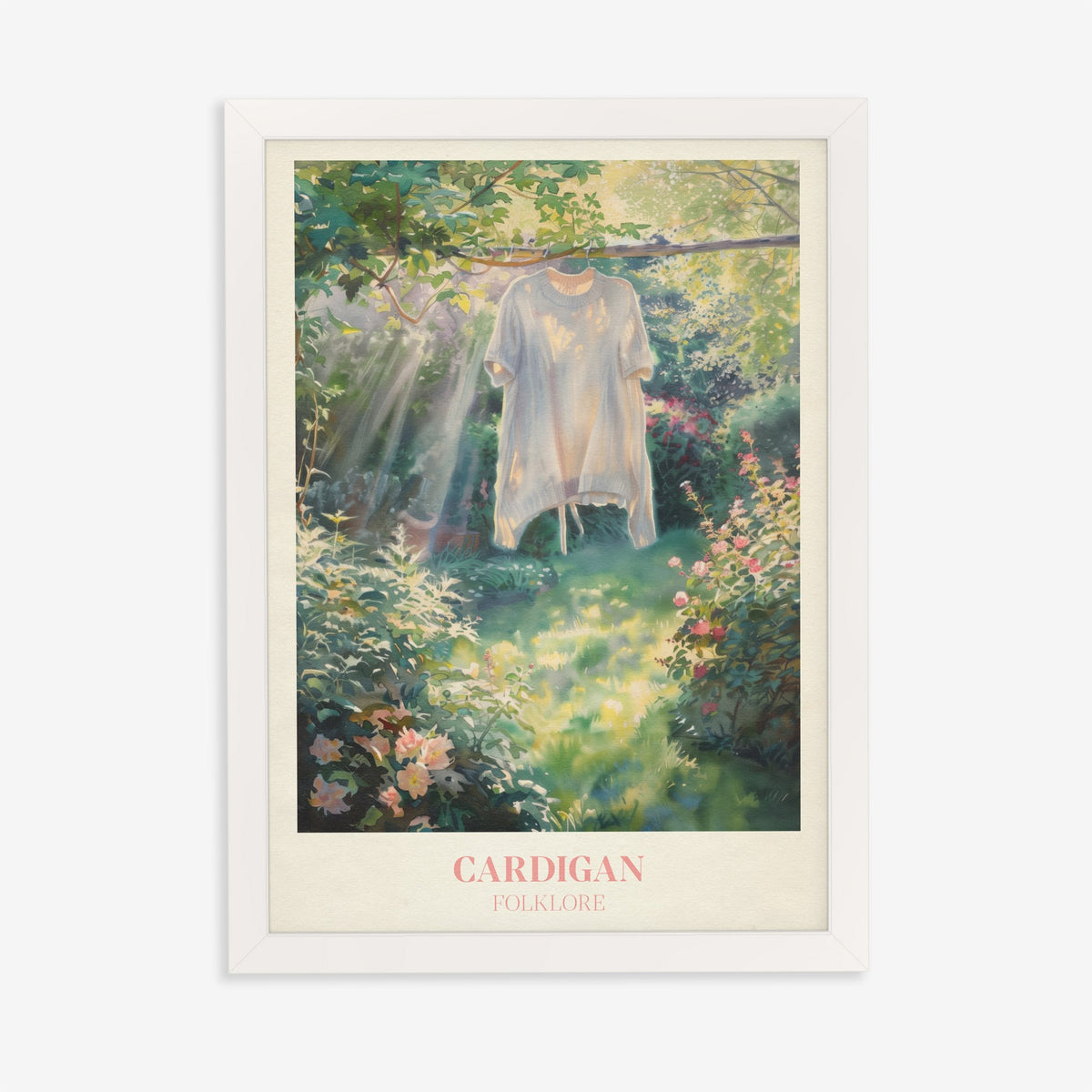 Cardigan Taylor Swift print of a cream cardigan hanging from a branch in a rose garden, in a white frame on a plain wall