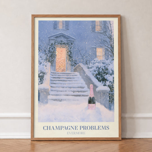 Champagne Problems Winter Taylor Swift print of champagne on snowy steps, in an oak frame, leaning against a wall on a herringbone floor