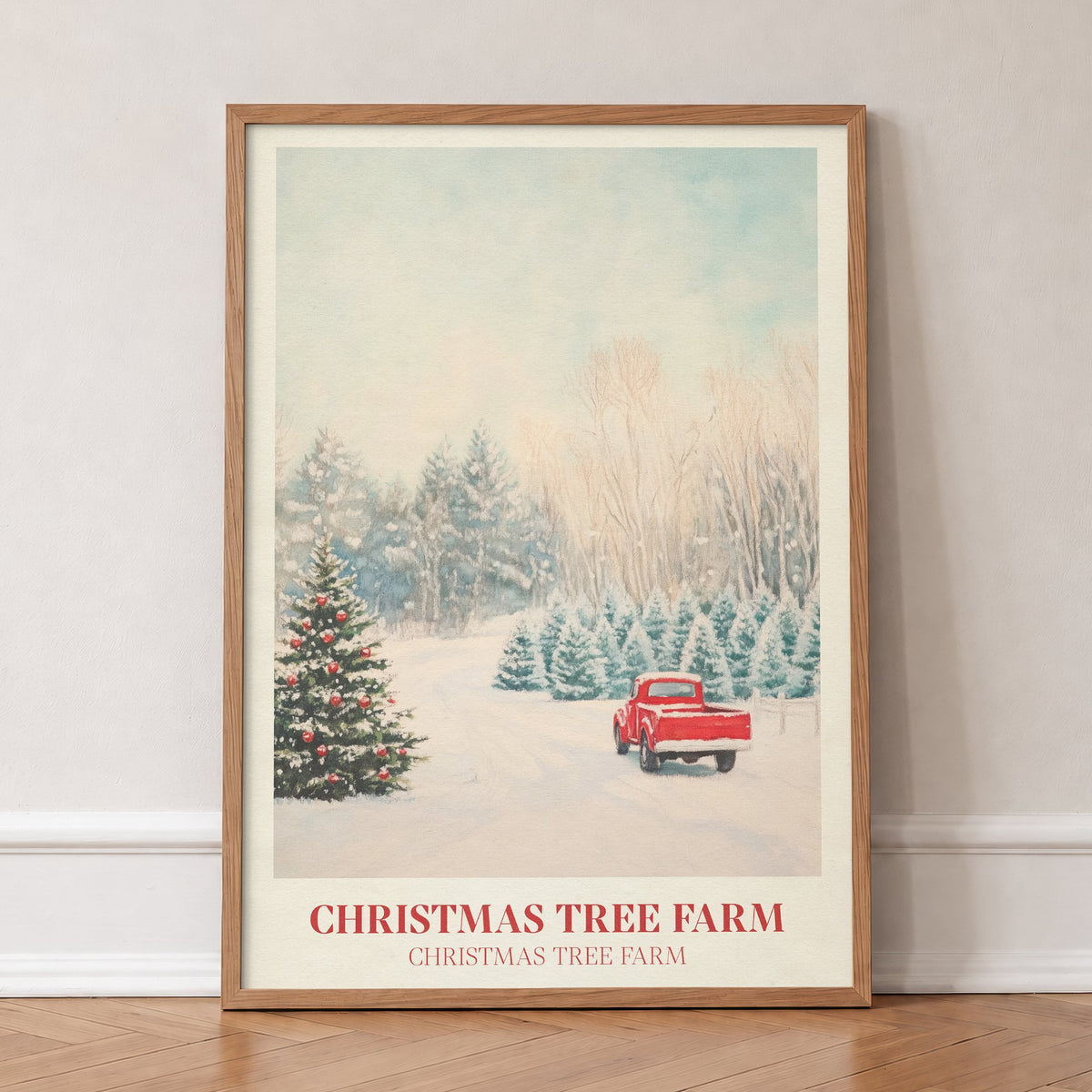 Christmas Tree Farm Taylor Swift print of a red truck on a snowy Christmas tree farm, in an oak frame, leaning against a wall on a herringbone floor