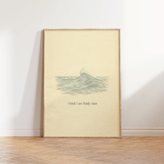 Clean Minimal Taylor Swift print of a line-drawn breaking wave on cream paper, framed, leaning against a white wall