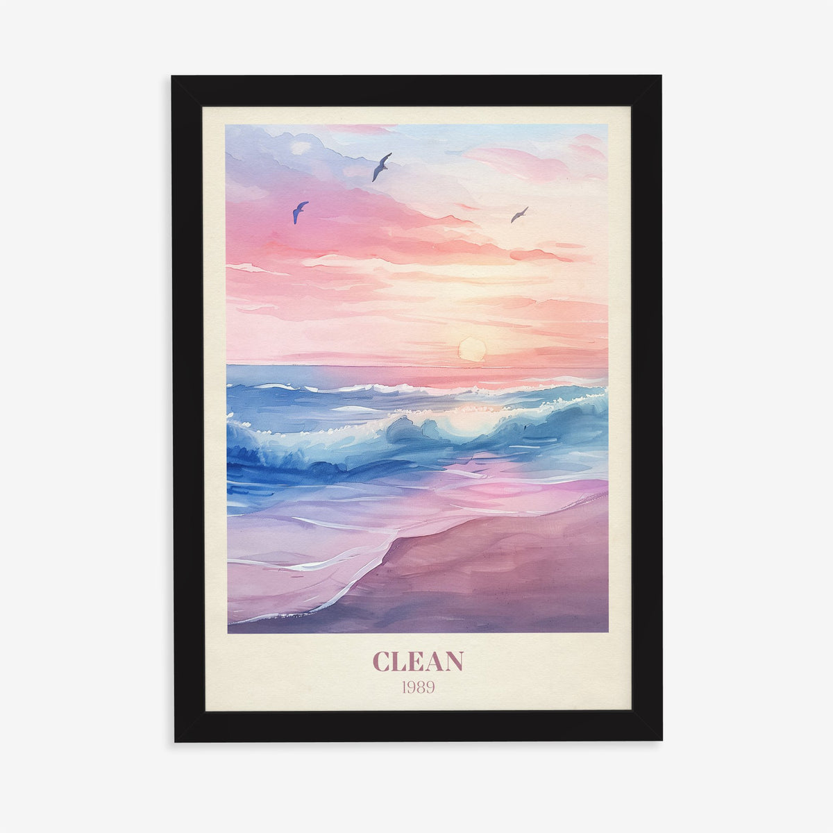 Clean Taylor Swift print of waves rolling onto a pink beach under a lilac sunset, in a black frame on a plain wall