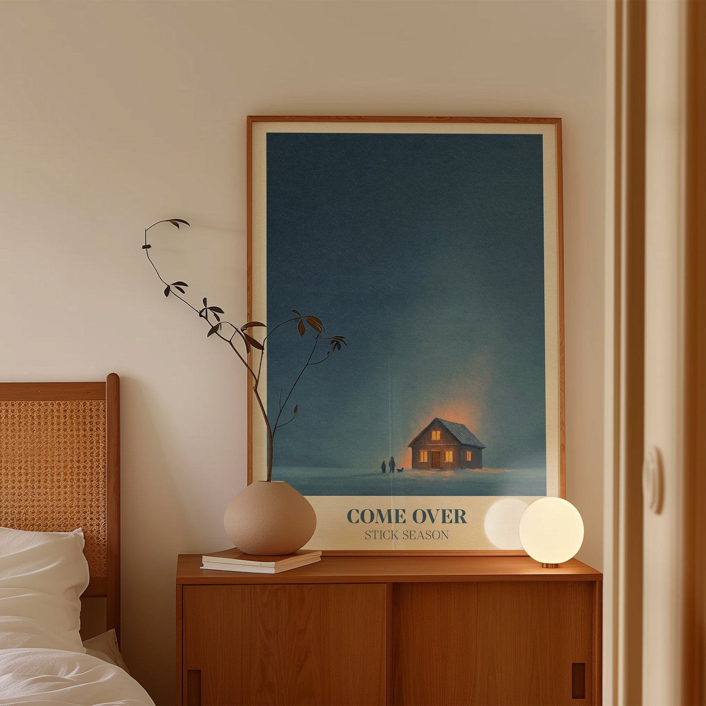 Come Over lyric wall art print inspired by Noah Kahan leaning on a wooden sideboard in a Scandi bedroom
