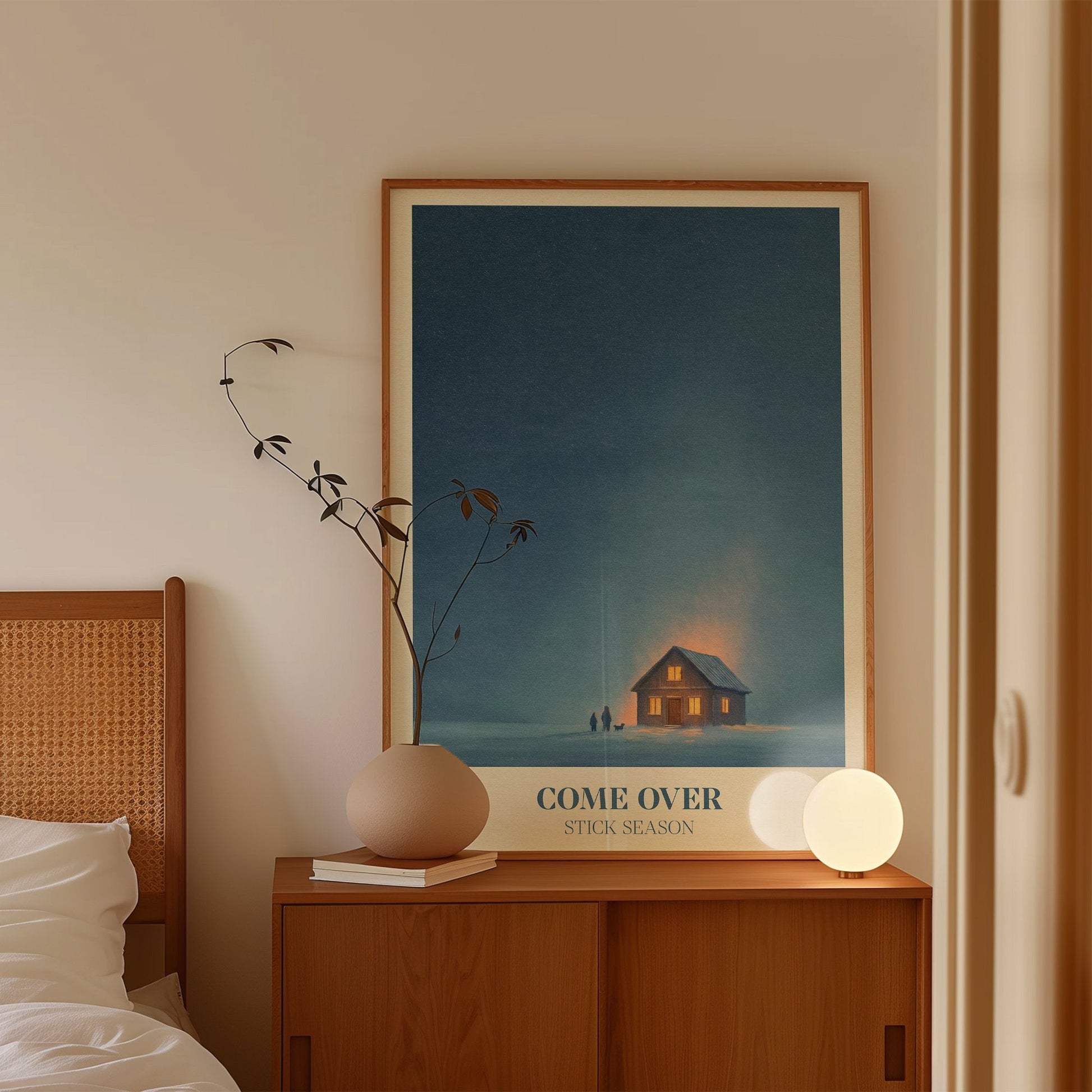 Come Over lyric wall art print inspired by Noah Kahan leaning on a wooden sideboard in a Scandi bedroom