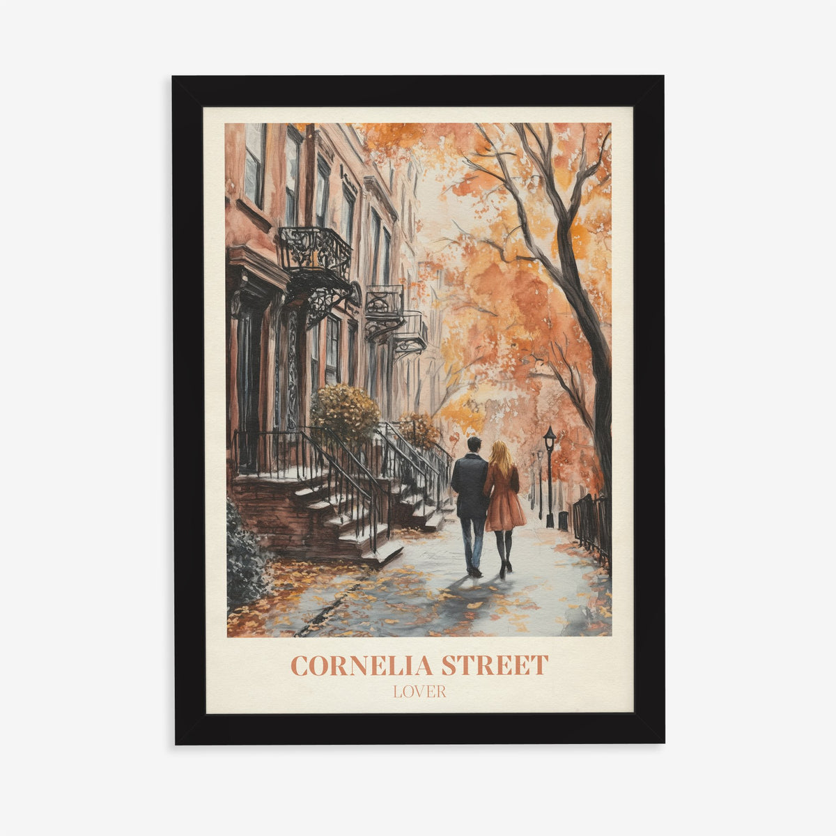 Cornelia Street Taylor Swift print of a couple walking an autumn street of brick townhouses, in a black frame on a plain wall