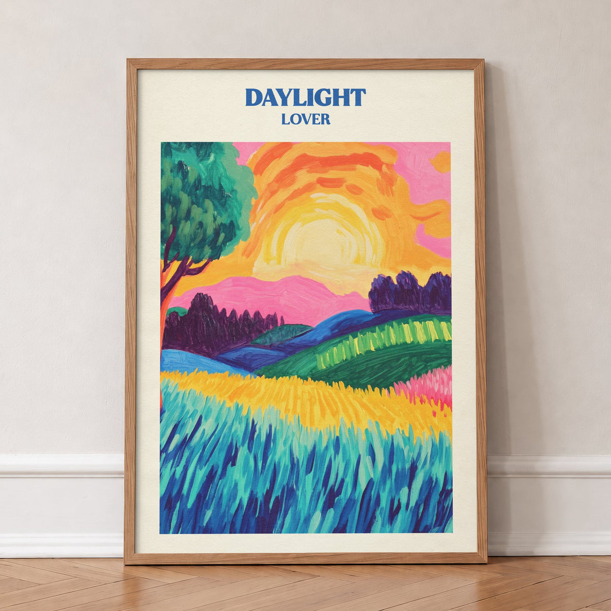 Daylight Matisse Taylor Swift print of bold fields and hills under a big yellow sun, in an oak frame, leaning against a wall on a herringbone floor