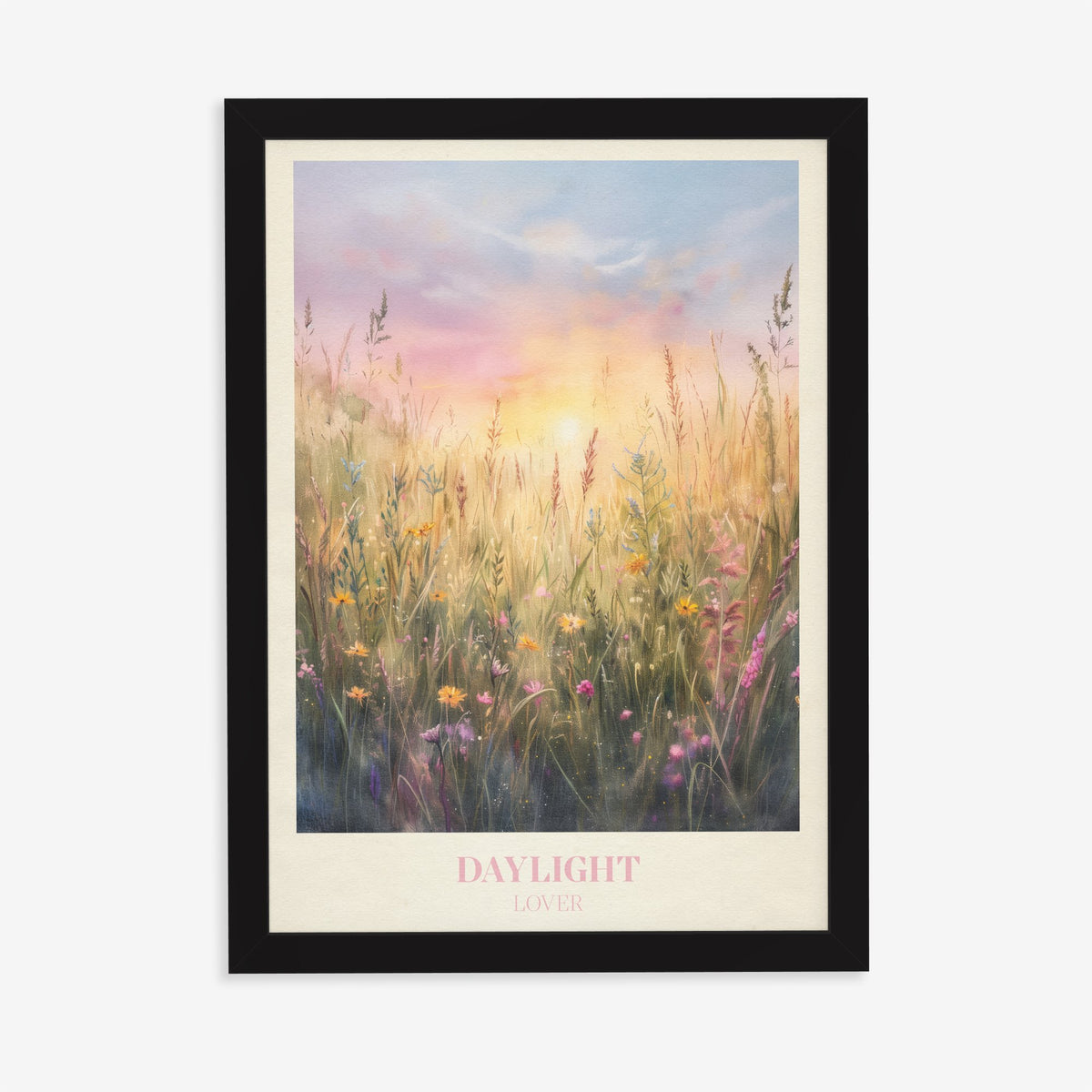 Daylight Taylor Swift print of wild grasses and flowers in golden morning light, in a black frame on a plain wall