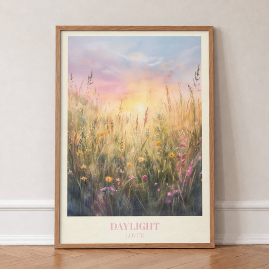 Daylight Taylor Swift print of wild grasses and flowers in golden morning light, in an oak frame, leaning against a wall on a herringbone floor