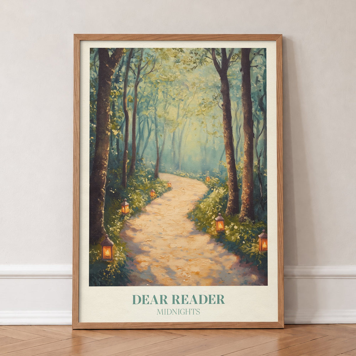 Dear Reader Taylor Swift print of a sunlit woodland path with small lanterns, in an oak frame, leaning against a wall on a herringbone floor