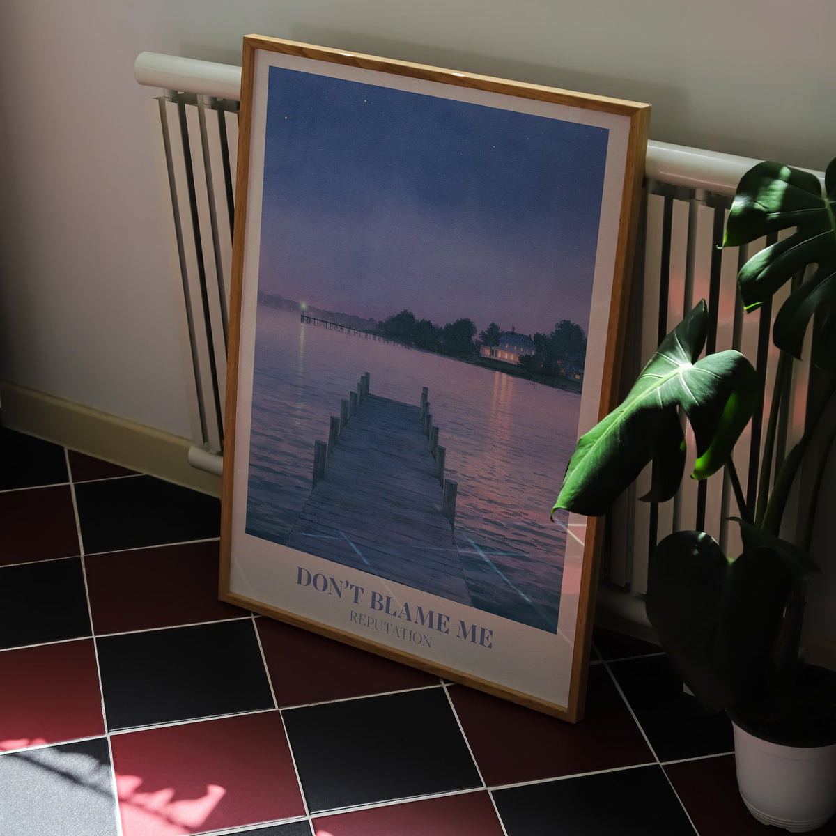 Don’t Blame Me Taylor Swift print of a jetty on a lake at dusk, on a kitchen floor with red and black tiles