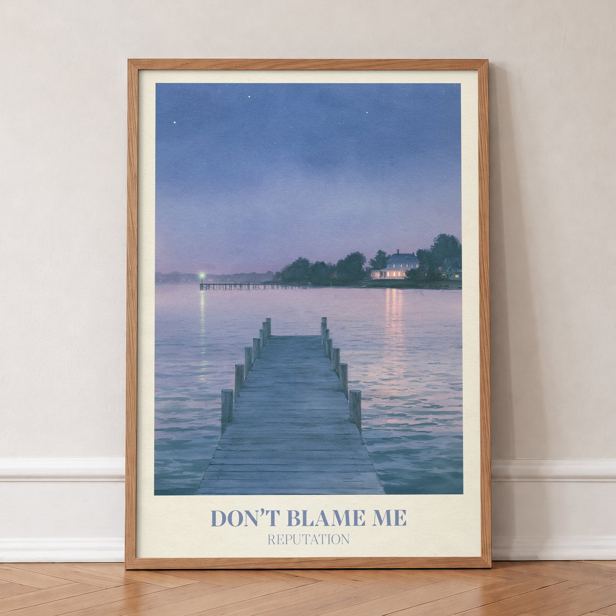 Don’t Blame Me Taylor Swift print of a jetty on a lake at dusk, in an oak frame, leaning against a wall on a herringbone floor