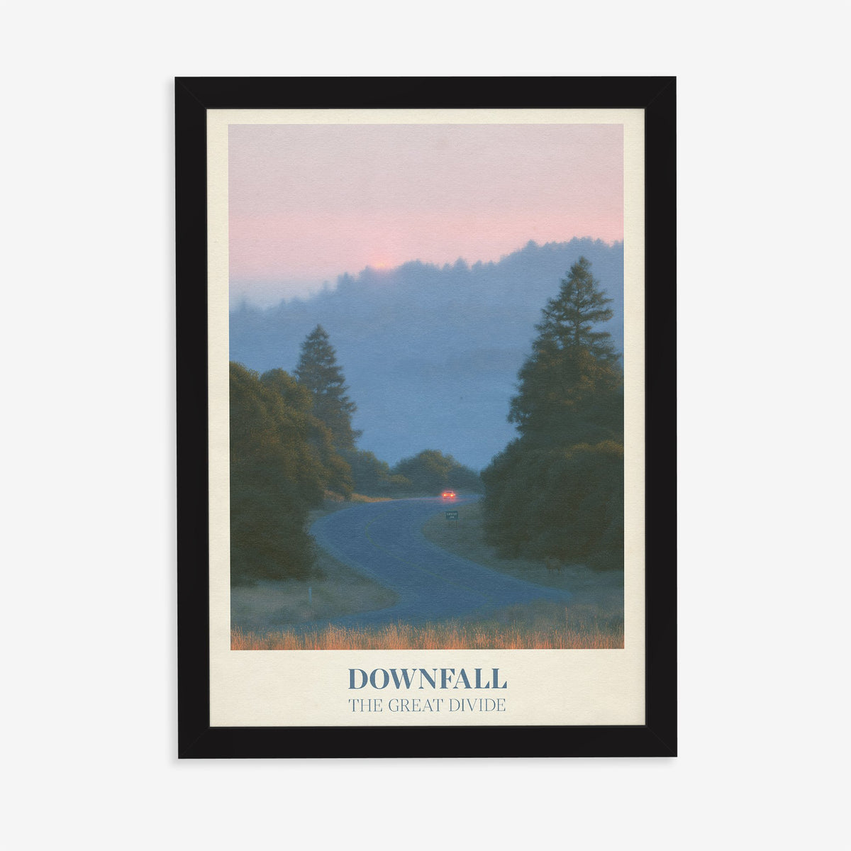Downfall Noah Kahan print of a winding road through misty pine hills at dusk, in a black frame on a plain wall