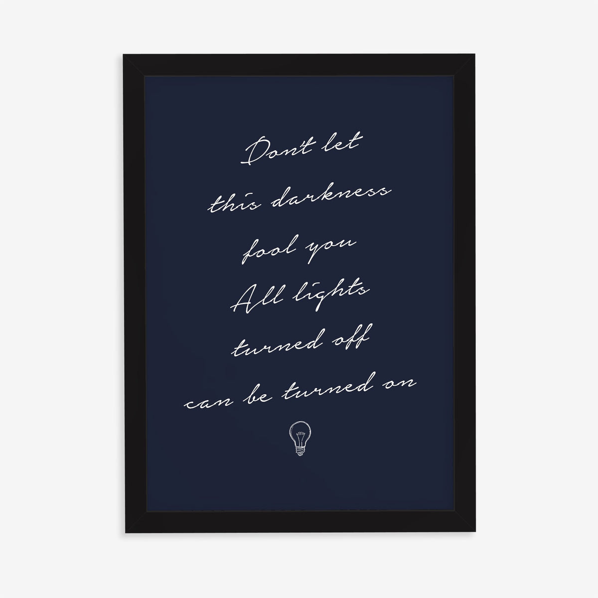 Don't Let This Darkness Fool You Noah Kahan lyric print in white handwriting on navy, in a black frame on a plain wall