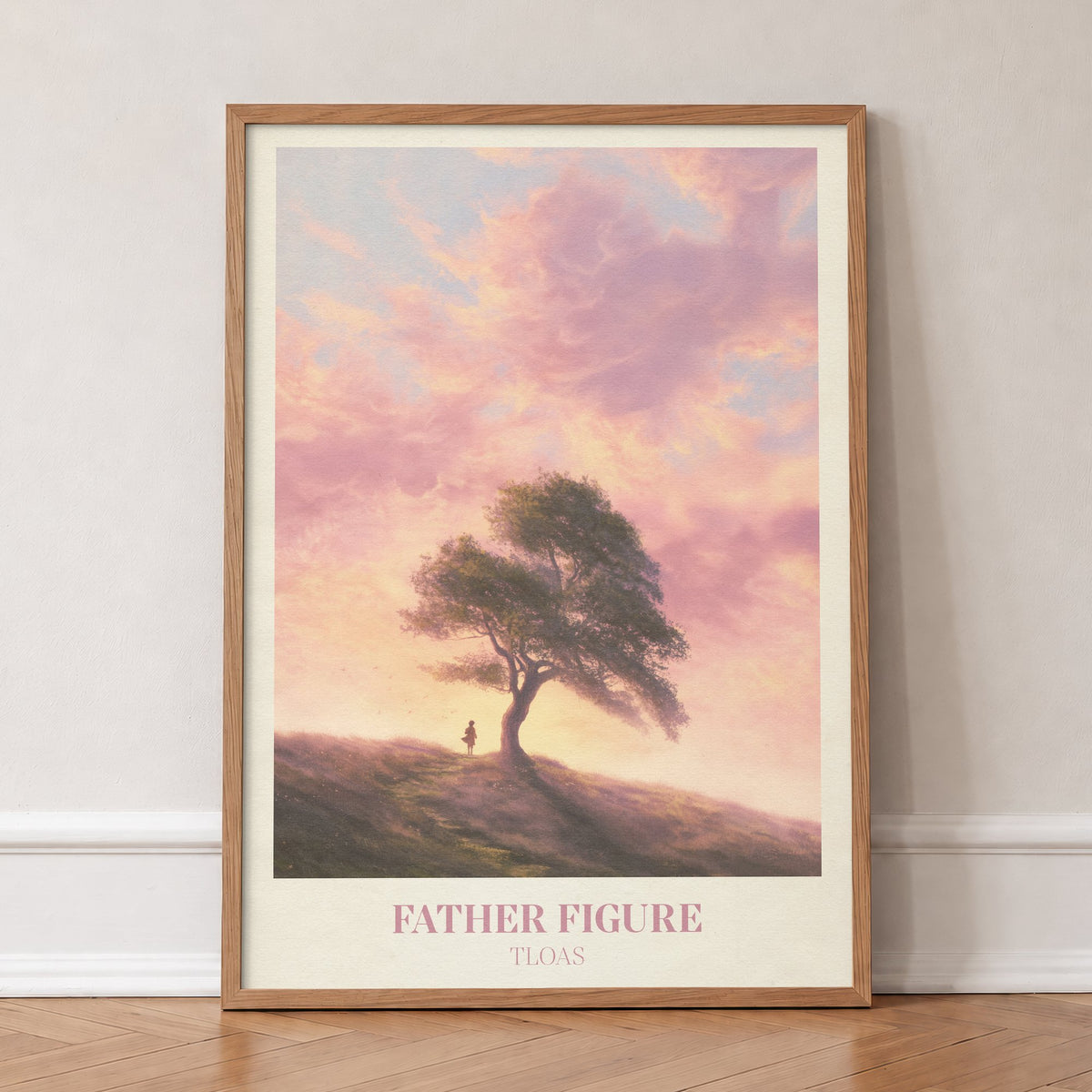 Father Figure Taylor Swift print of two figures under a windswept tree at sunset, in an oak frame, leaning against a wall on a herringbone floor