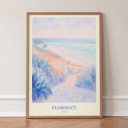 Florida!!! Pastel Taylor Swift print of a pastel path through dunes and palms to the sea, in an oak frame, leaning against a wall on a herringbone floor