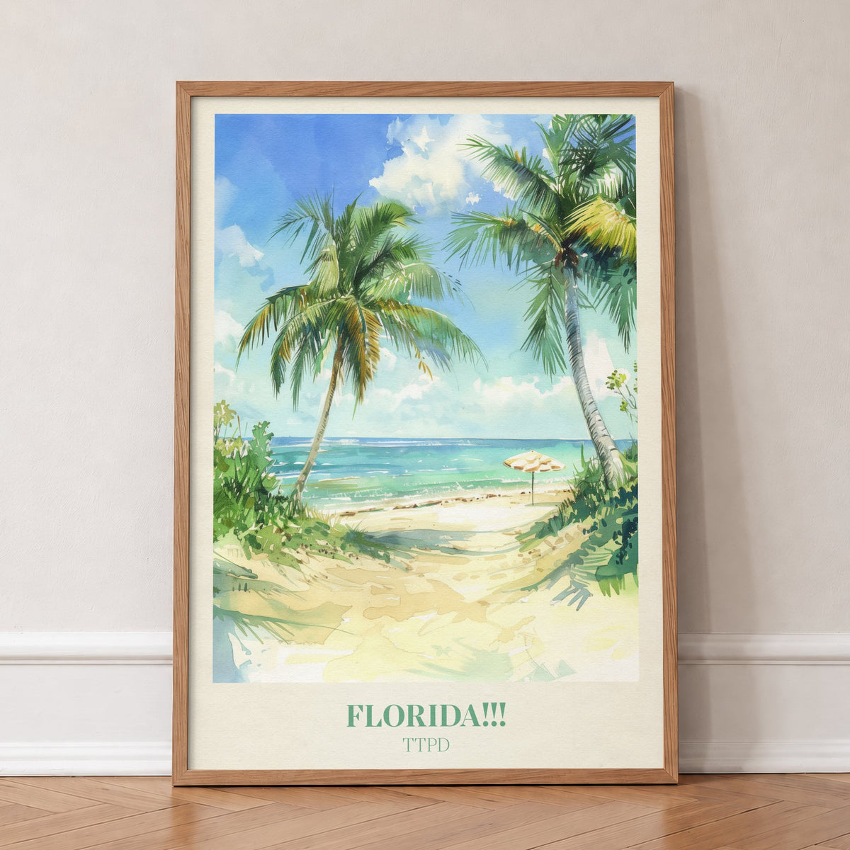 Florida!!! Taylor Swift print of palm trees over a sandy path to a turquoise sea, in an oak frame, leaning against a wall on a herringbone floor