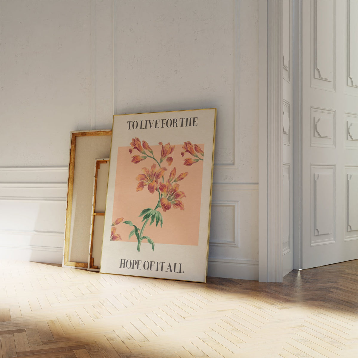For The Hope Of It All Taylor Swift print of orange lilies on a peach square, leaning against a white panelled wall