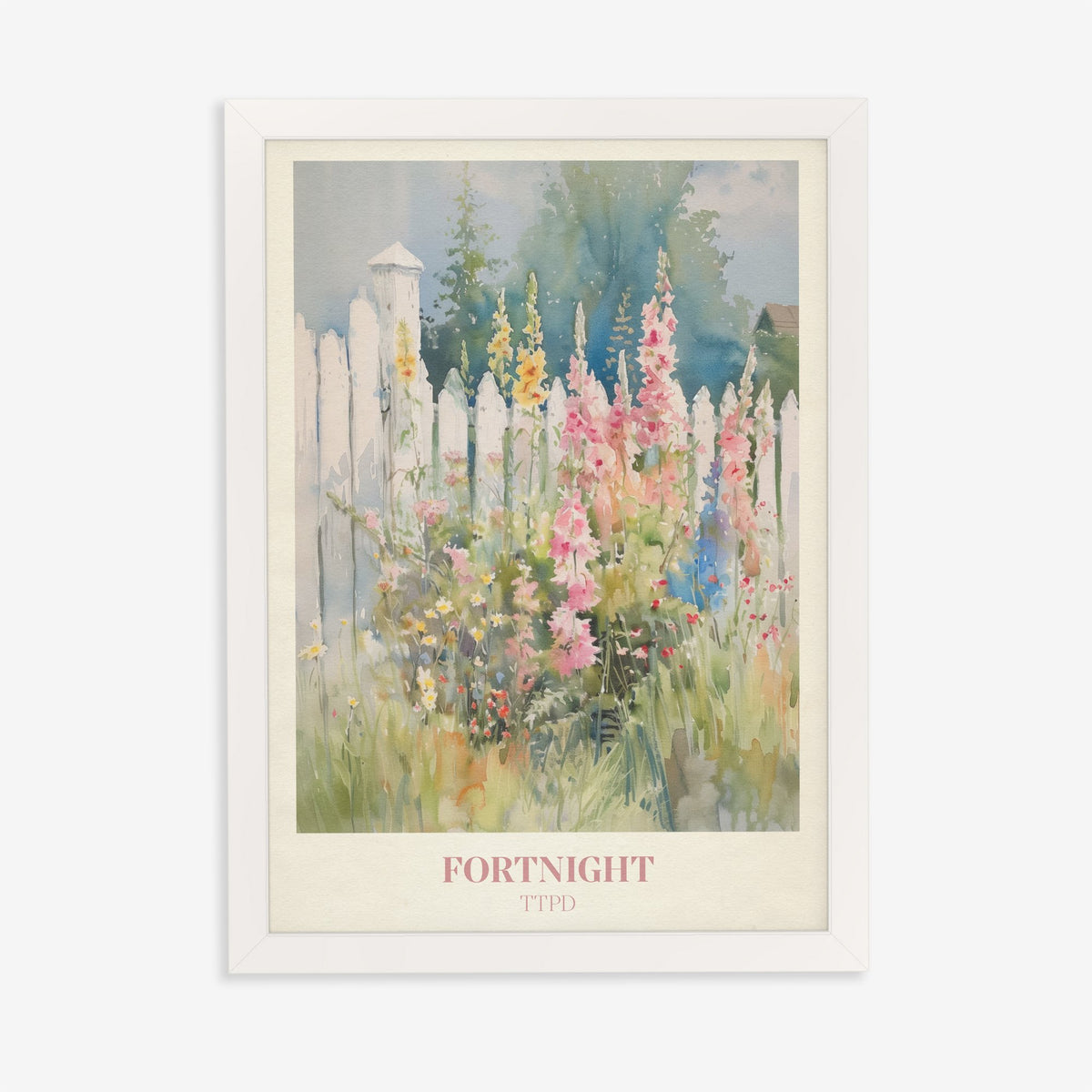 Fortnight Taylor Swift print of hollyhocks and wildflowers by a white picket fence, in a white frame on a plain wall