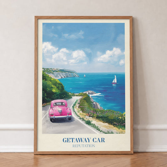 Getaway Car Taylor Swift print of a pink car on a coastal road above a turquoise sea, in an oak frame, leaning against a wall on a herringbone floor