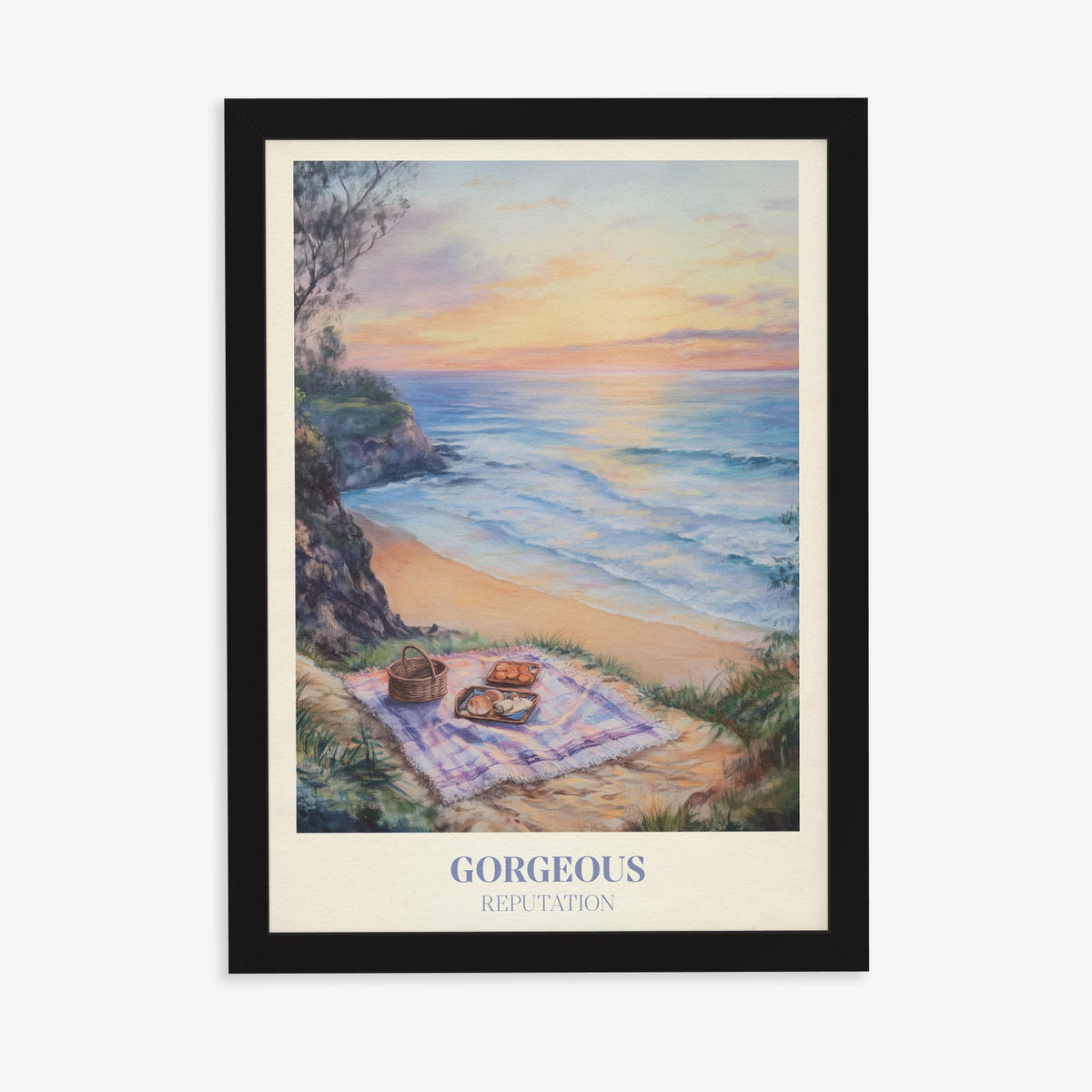 Gorgeous Taylor Swift print of a picnic blanket and basket on a clifftop above the sea at sunset, in a black frame on a plain wall