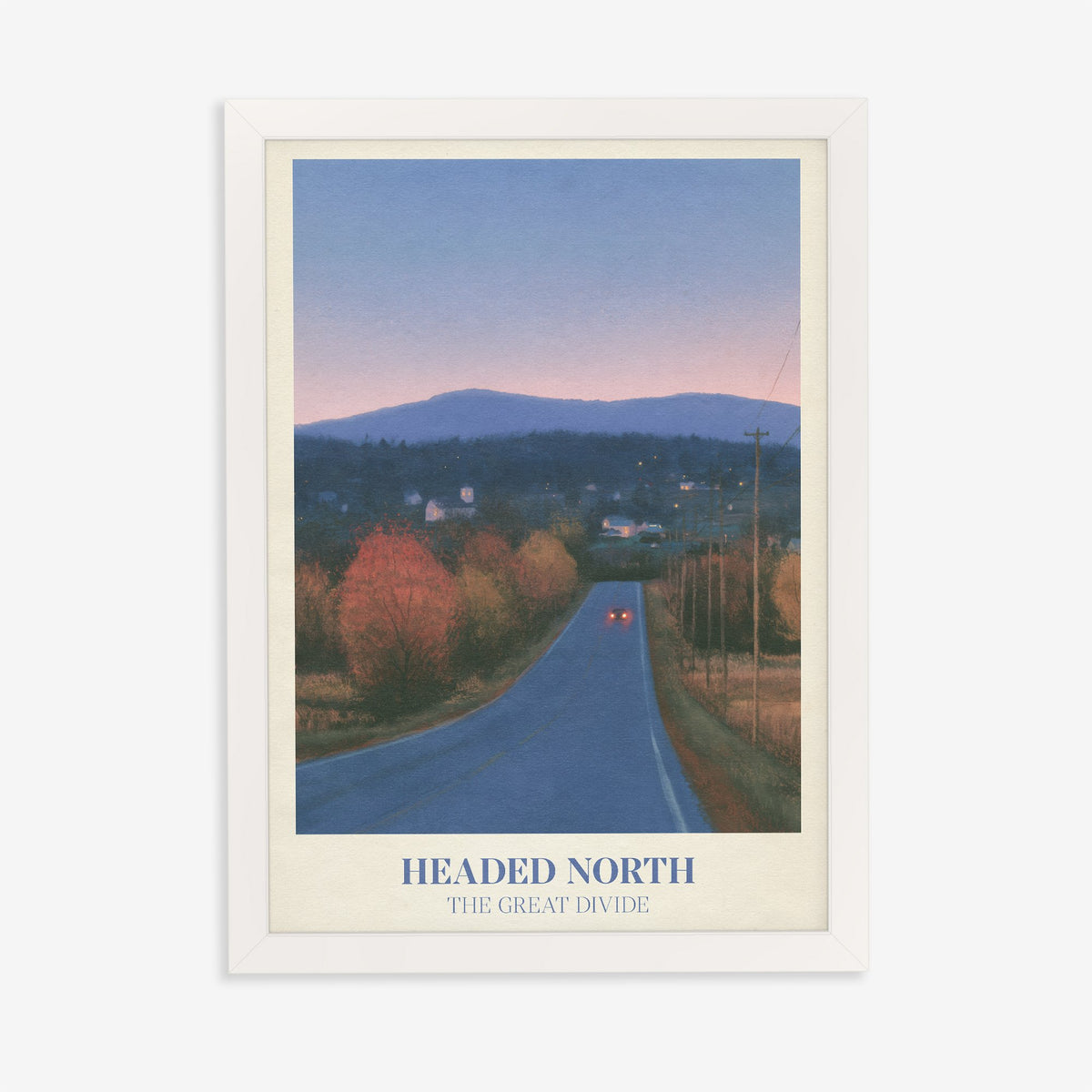 Headed North Noah Kahan print of a country road through autumn trees at dusk, in a white frame on a plain wall