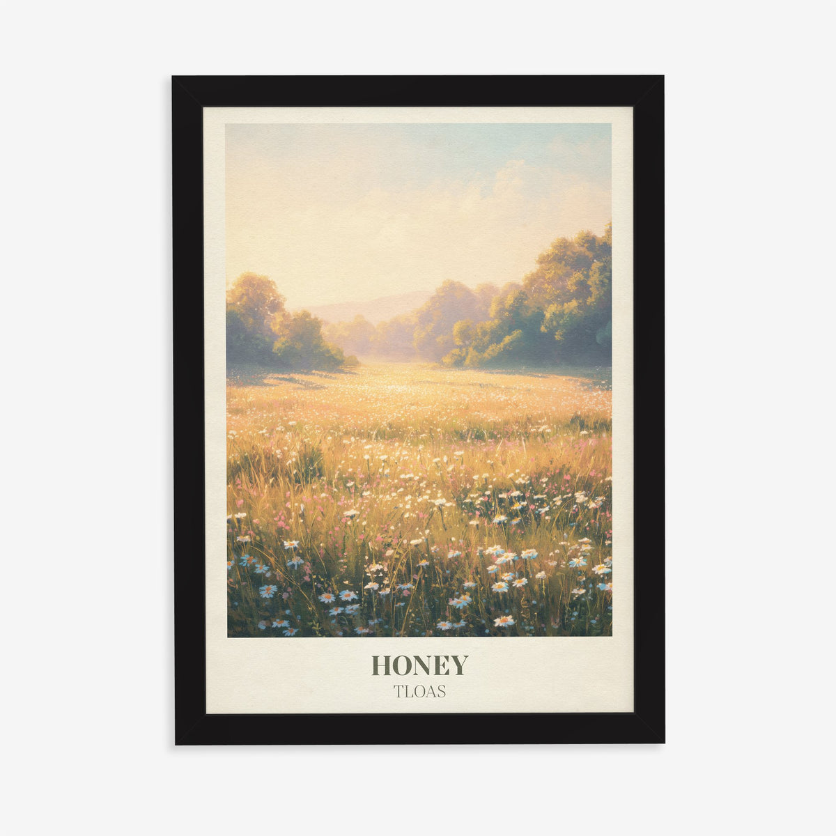 Honey Taylor Swift print of a wildflower meadow in warm golden light, in a black frame on a plain wall