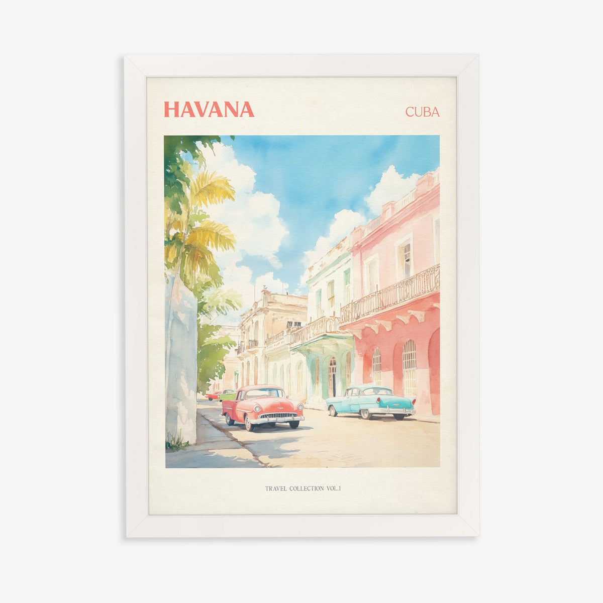 Havana travel print of pastel pink and mint buildings with classic cars parked outside, in a white frame on a plain wall